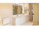 Spacious bathroom with a double sink vanity and a separate glass shower at 12112 Autumn Winds Ln, Pineville, NC 28134