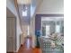 Bright foyer with hardwood floors leads into the home's living spaces at 12112 Autumn Winds Ln, Pineville, NC 28134
