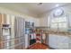 Bright kitchen with stainless steel appliances, granite countertops, and white cabinets at 12112 Autumn Winds Ln, Pineville, NC 28134