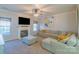 Inviting living room features a fireplace, neutral tones, and comfortable seating at 12112 Autumn Winds Ln, Pineville, NC 28134
