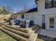 Multi-tiered back deck with outdoor seating and a view of the backyard at 1225 Braeburn Rd, Charlotte, NC 28211