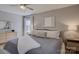 Bright bedroom with a king-size bed, dresser, and natural light from a window at 1225 Braeburn Rd, Charlotte, NC 28211