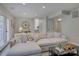 Cozy living room with decorative flooring, a sectional sofa, and a walkout to the patio at 1225 Braeburn Rd, Charlotte, NC 28211