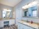 Bathroom features double sinks with granite countertops and large framed mirrors at 13807 Queenswater Ln, Charlotte, NC 28273