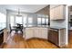 Bright kitchen featuring stainless steel appliances and granite countertops at 13807 Queenswater Ln, Charlotte, NC 28273