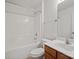 Clean bathroom features a shower-tub combo with sleek fixtures and a white vanity, perfect for a modern look at 140 N Arcadian Way, Mooresville, NC 28117