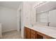 Bright bathroom with a large vanity, wood cabinets and a walk-in closet at 140 N Arcadian Way, Mooresville, NC 28117