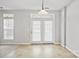 Bright dining area with backyard access through glass panel door and large window at 140 N Arcadian Way, Mooresville, NC 28117