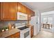 Well-equipped kitchen features ample counter space and flows into the dining area at 140 N Arcadian Way, Mooresville, NC 28117