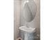 Bright powder room with pedestal sink, chrome faucet, large oval mirror, and neutral wall color at 140 N Arcadian Way, Mooresville, NC 28117