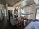 Well-appointed kitchen with stainless appliances, central island, and subway tile backsplash at 1934 Hollybrook Ln, Lancaster, SC 29720