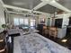 Open-concept living room seamlessly connecting to the kitchen, creating a spacious and modern living space at 1934 Hollybrook Ln, Lancaster, SC 29720