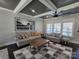 Inviting living room featuring coffered ceilings, neutral tones, and large windows for natural light at 1934 Hollybrook Ln, Lancaster, SC 29720