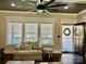 Bright living room area featuring neutral tones, comfortable seating, and a clear view of the front entry at 1934 Hollybrook Ln, Lancaster, SC 29720