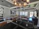 Combined living and kitchen area featuring elegant lighting, cozy seating, and a welcoming atmosphere at 1934 Hollybrook Ln, Lancaster, SC 29720