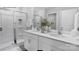 Bright bathroom featuring a double vanity, framed mirrors, and a walk-in shower at 208 Parker Claire Ln, Kings Mountain, NC 28086