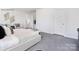 Neutral bedroom with a cozy seating area, decor and plush carpeting at 208 Parker Claire Ln, Kings Mountain, NC 28086