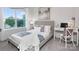 Comfortable bedroom featuring neutral tones, a large window, and a desk at 208 Parker Claire Ln, Kings Mountain, NC 28086