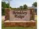 Entrance sign for Brinkley Ridge, set amid landscaped grounds, with a stone facade at 208 Parker Claire Ln, Kings Mountain, NC 28086