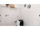 Functional laundry area with storage, shelving, and modern design elements at 208 Parker Claire Ln, Kings Mountain, NC 28086