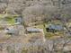High-angle view of a residential property highlighting the neighborhood and trees at 211 Kingsway Cir, Charlotte, NC 28214