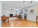 Living room featuring a fireplace, hardwood floors, and natural light at 211 Kingsway Cir, Charlotte, NC 28214