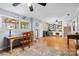 Open living room featuring a desk and a lot of natural light at 211 Kingsway Cir, Charlotte, NC 28214