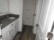 Bathroom featuring dual sinks and a granite countertop vanity at 212 Sugar Hill Rd, Troutman, NC 28166