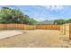 The spacious backyard features a wooden privacy fence and a small concrete patio at 230 Georgia Sw St, Concord, NC 28025