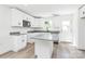 Modern kitchen with stainless steel appliances, granite countertops, and white cabinetry at 230 Georgia Sw St, Concord, NC 28025