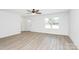 Sun-filled living room with ample space featuring luxury vinyl plank flooring at 230 Georgia Sw St, Concord, NC 28025