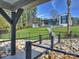 Picturesque view of backyard and home from private dock with mature trees and lush lawn at 2536 Brawley School Rd, Mooresville, NC 28117