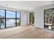 Spacious bedroom with large windows and beautiful lake views at 2536 Brawley School Rd, Mooresville, NC 28117