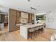 Gourmet kitchen featuring a large center island, stainless appliances, and custom cabinetry at 2536 Brawley School Rd, Mooresville, NC 28117