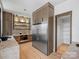 Kitchen featuring stainless steel appliances, custom cabinets, and adjacent pantry at 2536 Brawley School Rd, Mooresville, NC 28117