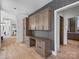 Office area with custom built-in storage and modern design elements at 2536 Brawley School Rd, Mooresville, NC 28117