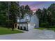 Charming two-story home with beautiful lawn and an attached garage, perfect for families at 3117 Williams Rd, Matthews, NC 28105