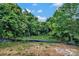 Exterior lot showing wooded backyard, ready for new construction and development at 425 Messner St, Salisbury, NC 28144