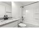 Bathroom features granite countertop vanity, white cabinets, and shower-tub combination at 425 Messner St, Salisbury, NC 28144