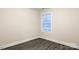 Bedroom showcasing neutral walls, a bright window, and wood-look floors at 425 Messner St, Salisbury, NC 28144