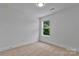 Bright bedroom with neutral carpet and a window that provides natural light at 425 Messner St, Salisbury, NC 28144