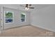 Bedroom with dual windows and neutral carpet that allow for lots of natural light at 425 Messner St, Salisbury, NC 28144