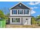 Charming new two-story home with white siding, black shutters, and a covered front porch at 425 Messner St, Salisbury, NC 28144