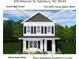 Charming two-story home featuring white siding, black shutters, and dark trim for a modern, appealing look at 425 Messner St, Salisbury, NC 28144