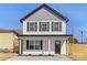 Charming two-story home featuring a modern gray and white color scheme and a well-manicured front yard at 425 Messner St, Salisbury, NC 28144