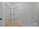 Hallway with neutral walls and carpeted floors, providing access to rooms at 425 Messner St, Salisbury, NC 28144