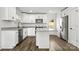 Modern kitchen featuring white cabinets, stainless steel appliances, granite countertops, and a functional island at 425 Messner St, Salisbury, NC 28144