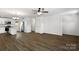 Bright living space connecting the kitchen and living area, featuring new hardwood floors at 425 Messner St, Salisbury, NC 28144