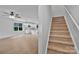 Open floor plan living space with kitchen, and stairs to upper level at 425 Messner St, Salisbury, NC 28144