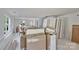 Bright living room featuring fresh paint, trim, and large windows for ample natural light at 425 Messner St, Salisbury, NC 28144